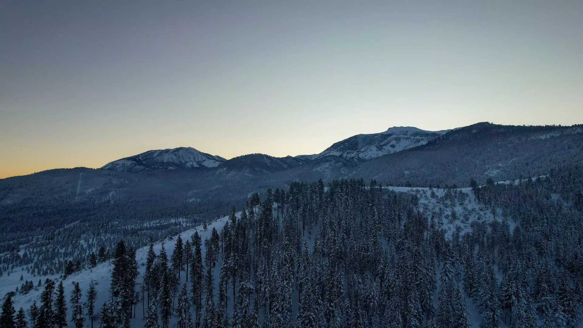 Photo of snowy foothills in Reno, Nevada with Mount Rose in the background.
