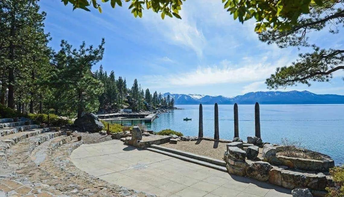 a platform stage with a view of Lake Tahoe and the mountains in the background